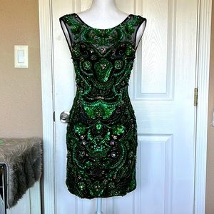 Size 6 Claudine mini dress heavy embellishments